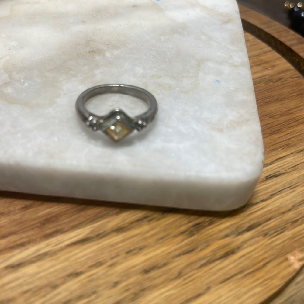 Silver and peridot ring